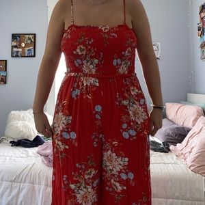 large red floral American Eagle jumpsuit